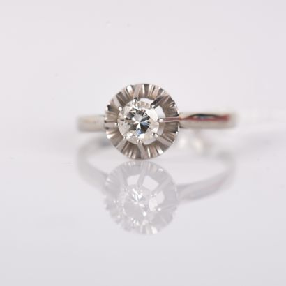 Sun-set solitaire ring with a modern-cut...
