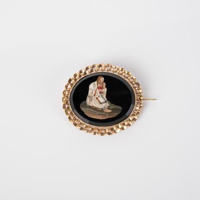 Brooch set in yellow gold (750 thousandths)...