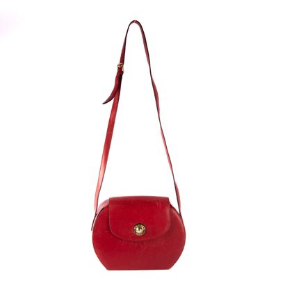 CELINE
Red leather shoulder bag, flap closure...