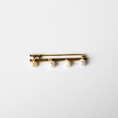 Small 18k yellow gold (750 thousandths) barrette...