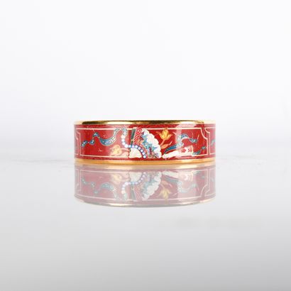HERMES
Bracelet in gilt metal and enameled...