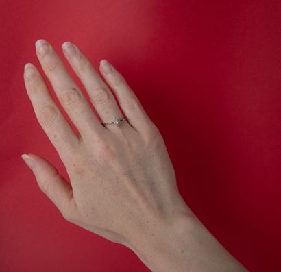 Solitaire ring set with a marquise-cut diamond,...