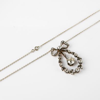 Pendant in yellow gold 750°/00 and silver...