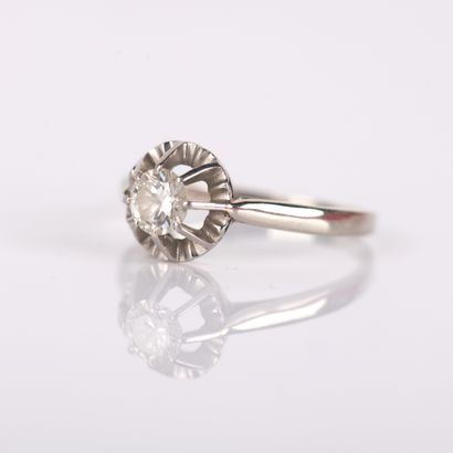 Sun-set solitaire ring with a modern-cut...