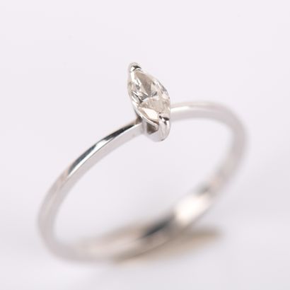 Solitaire ring set with a marquise-cut diamond,...
