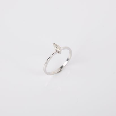 Solitaire ring set with a marquise-cut diamond,...