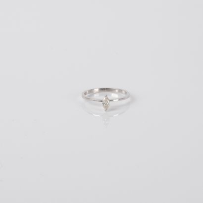 Solitaire ring set with a marquise-cut diamond,...