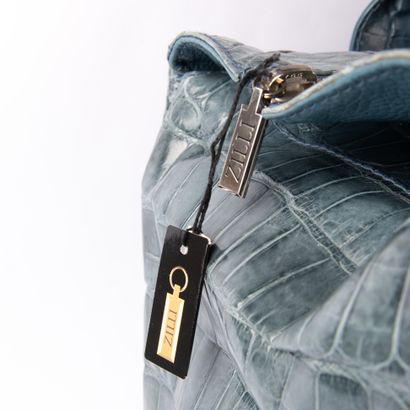 ZILLI
Light blue crocodile travel bag
Silver...