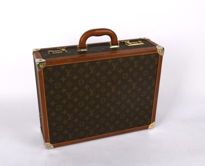 LOUIS VUITTON
Leather and canvas briefcase,...