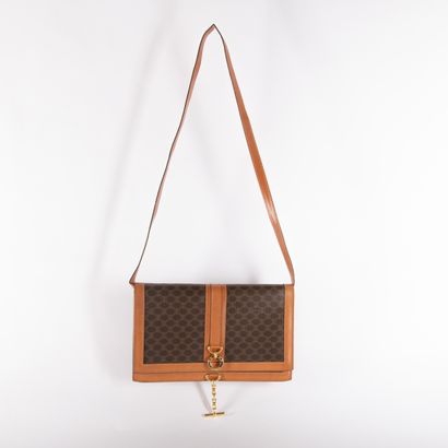 CELINE
Monogram canvas and brown leather...
