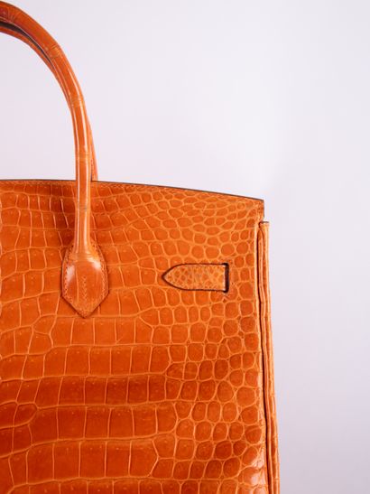 HERMES
Birkin 35 bag in orange crocodile...