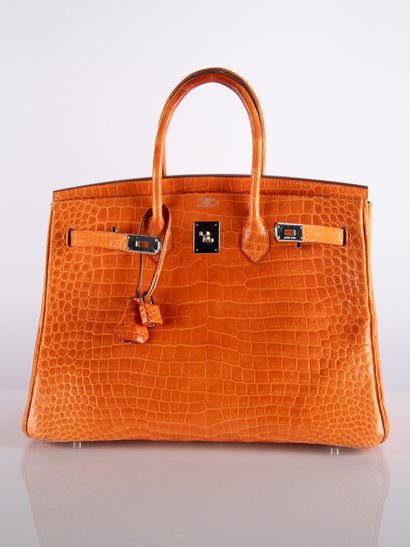 HERMES
Birkin 35 bag in orange crocodile...