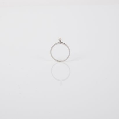 Solitaire ring set with a marquise-cut diamond,...