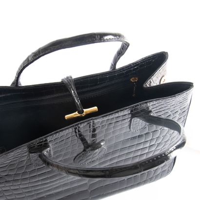 LONGCHAMP
Handbag in the style of the Roseau...