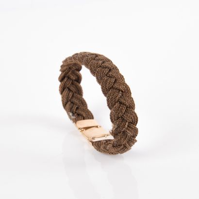 Bracelet braided with chestnut hair and finished...