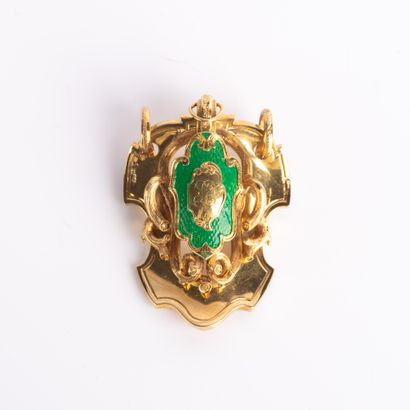 18 K (750 thousandths) yellow gold escutcheon...