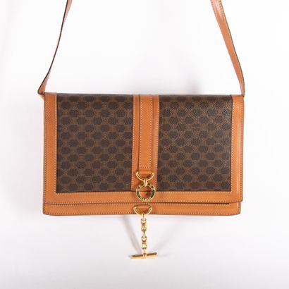 CELINE
Monogram canvas and brown leather...