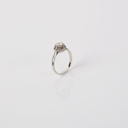 Sun-set solitaire ring with a modern-cut...