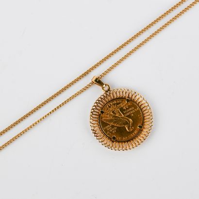 Yellow gold openwork pendant centered with...