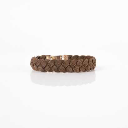 Bracelet braided with chestnut hair and finished...