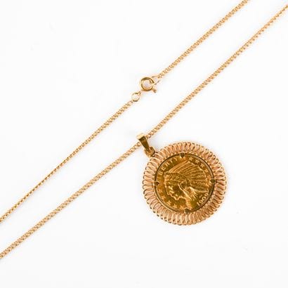 Yellow gold openwork pendant centered with...