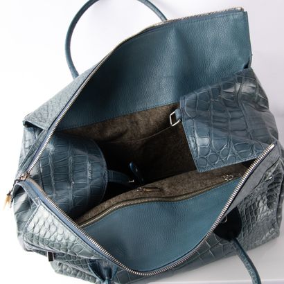 ZILLI
Light blue crocodile travel bag
Silver...