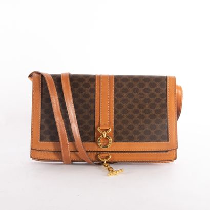 CELINE
Monogram canvas and brown leather...