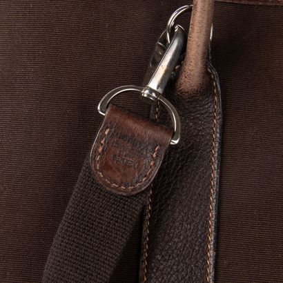 HERMES
Garden party bag in brown fabric and...