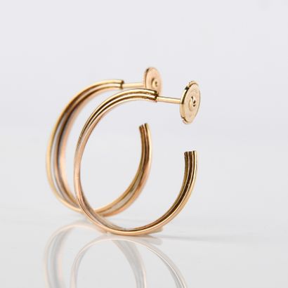 Pair of 18K (750 M) gold three-tone hoop...
