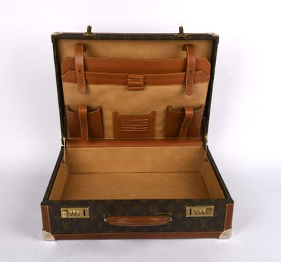 LOUIS VUITTON
Leather and canvas briefcase,...