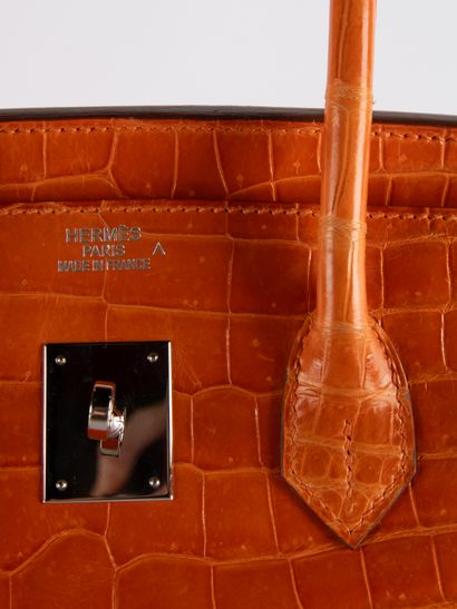 HERMES
Birkin 35 bag in orange crocodile...