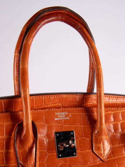 HERMES
Birkin 35 bag in orange crocodile...