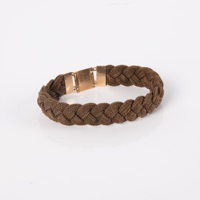 Bracelet braided with chestnut hair and finished...