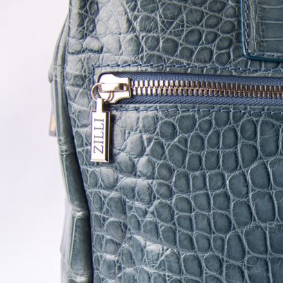 ZILLI
Light blue crocodile travel bag
Silver...