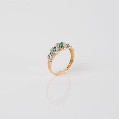 River ring with diamonds and three emeralds,...
