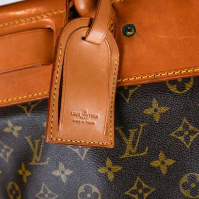 LOUIS VUITTON. 65 cm 