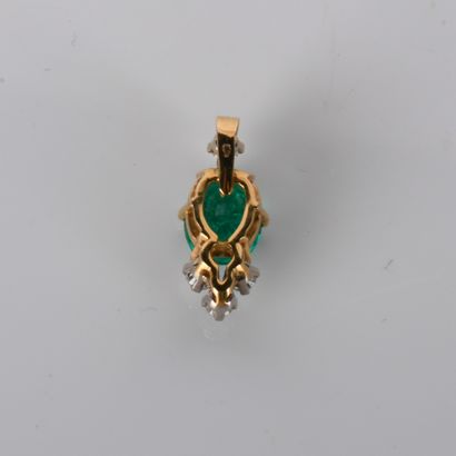 Pendant set with a 2-carat emerald and 4...