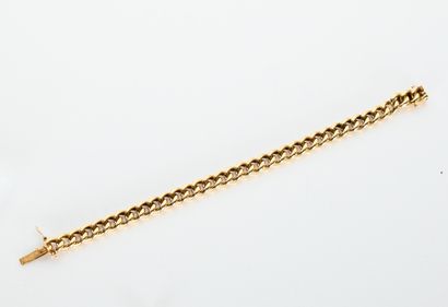 Yellow gold bracelet with hollow interlaced...