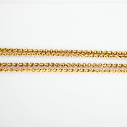 Long yellow gold chain with worked links
Length:...