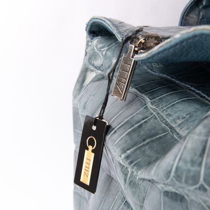 ZILLI
Light blue crocodile travel bag
Silver...