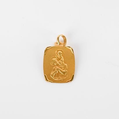 Yellow gold medal with Saint Christopher...