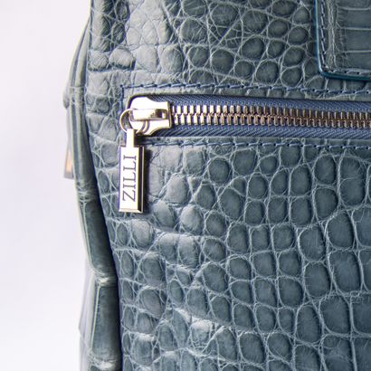 ZILLI
Light blue crocodile travel bag
Silver...