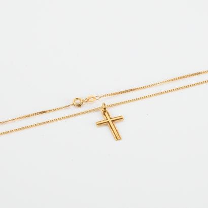 Cross and chain in 375°/00 yellow gold
H:...