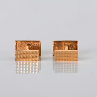 Pair of yellow gold cufflinks with diamond-patterned...