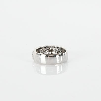 Ring set on one half with marquise-cut and...