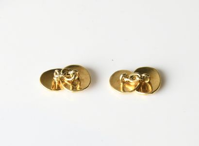 Pair of yellow gold cufflinks
18-carat (750-millimeter)...
