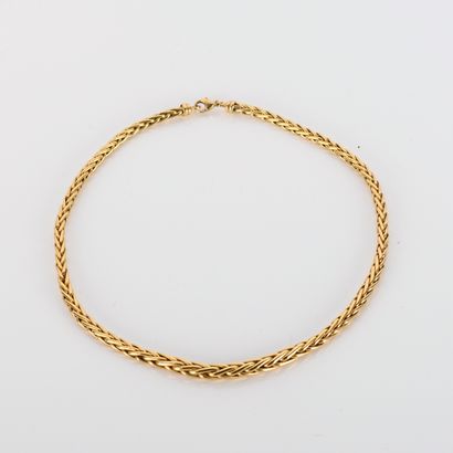 Palm-tree link necklace in 18
yellow gold...