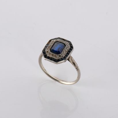 Art Deco period ring centered on a sapphire...