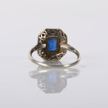 Art Deco period ring centered on a sapphire...