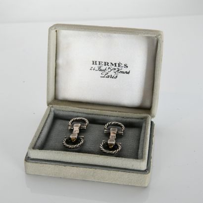 HERMES
Pair of stirrup cufflinks in 925 thousandths...